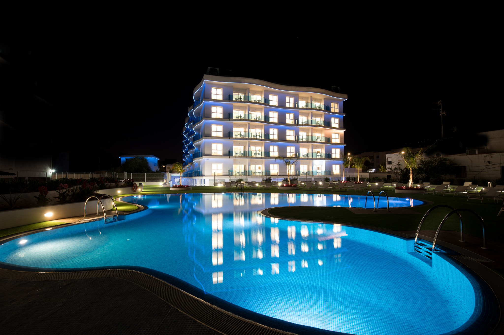 Hotel Castello Spain nomad remote 493454d2-0341-4df8-8b5f-2ca33d1d128a_Sea Experience Night view pool .jpg